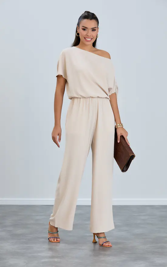 Off Shoulder Wide Leg Jumpsuit in Beige by Jenerique